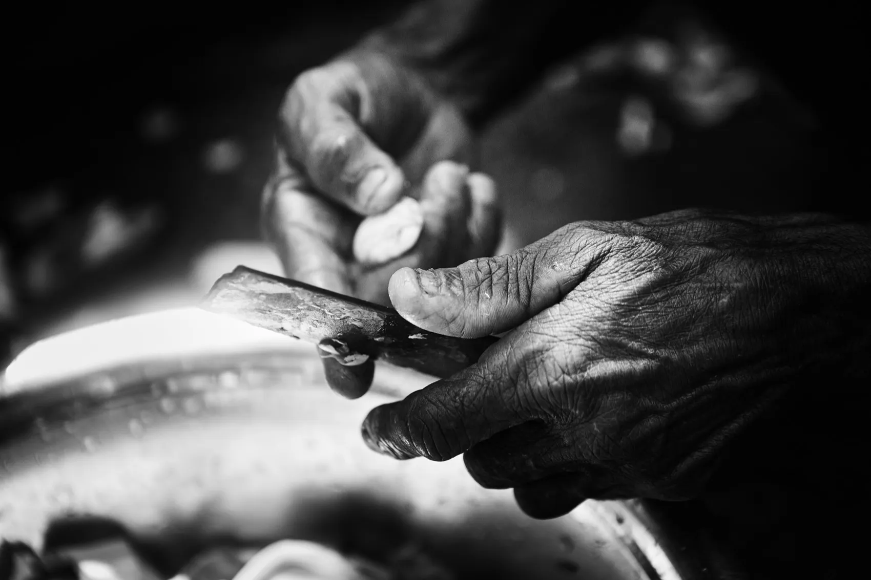 Hands over a bowl